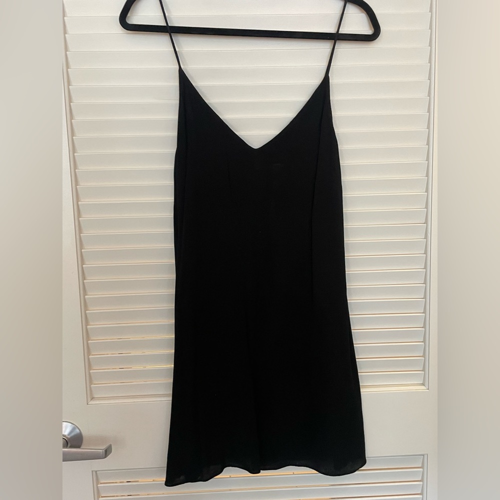 Black spaghetti strap mini dress.